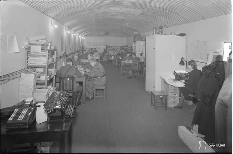 Staff of Ministry of Defence of Finland working at underground premises in Meilahti in the year 1940.